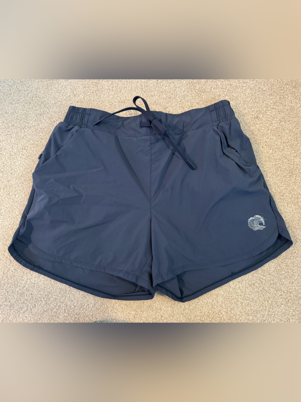 Women’s athletic shorts with compression shorts under